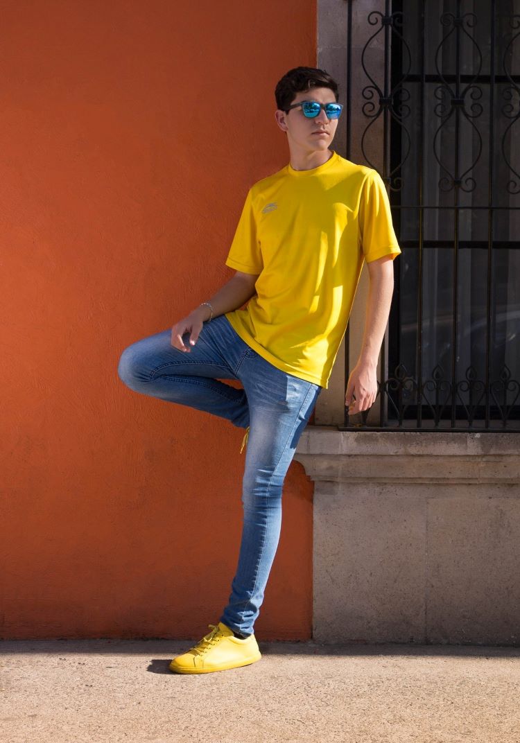 Man wearing blue t-shirt Man wearing blue t-shirt