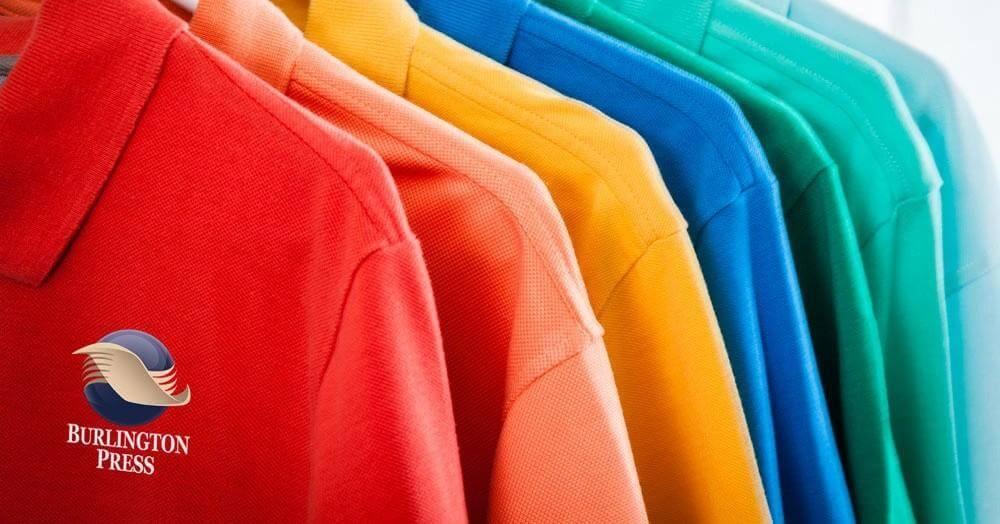 Colorful branded shirts on a rack