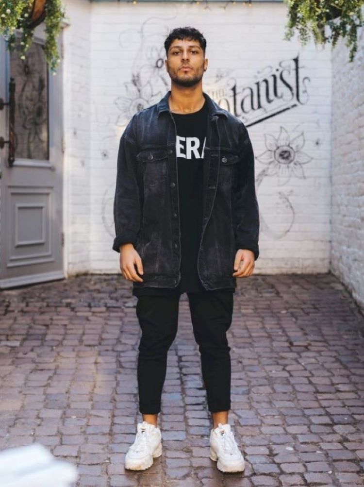 man in typical streetwear outfit man in typical streetwear outfit