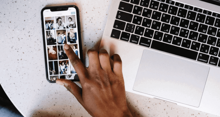 Person using phone and laptop for trendy tech accessories