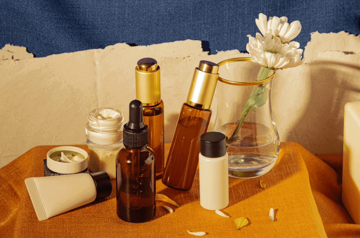 Various cosmetic bottles on a table for soothing skincare